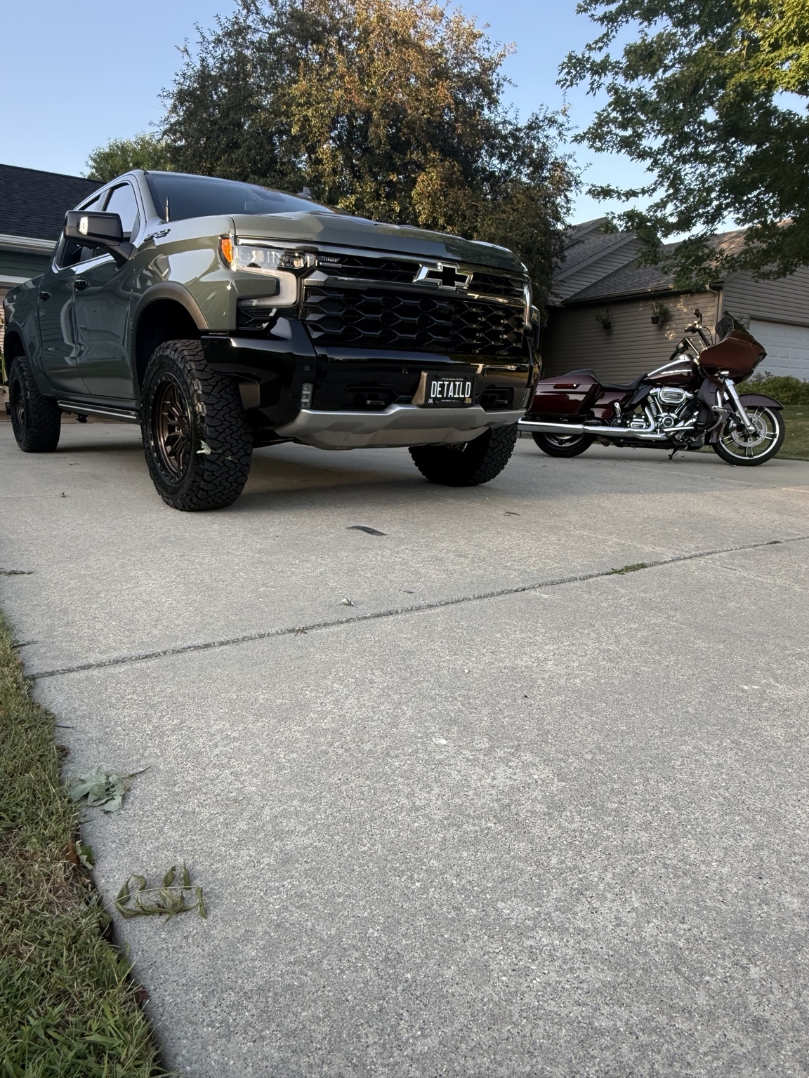 Cypress Gray Silverado ZR2 and Twisted Cherry Road Glide detailed by Andrist Detailing